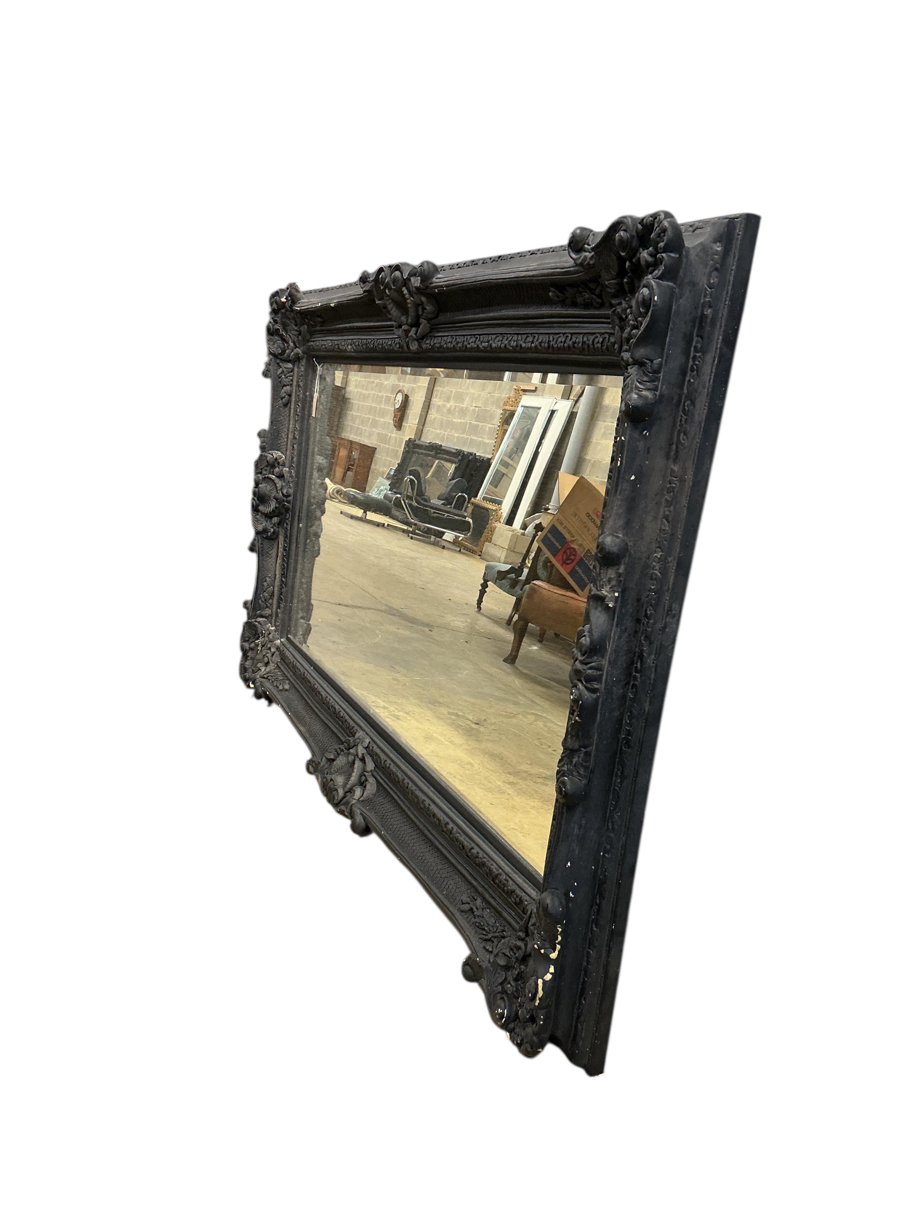 A large Victorian style 'Heritage' rectangular black painted wall mirror, width 226cm, height 136cm